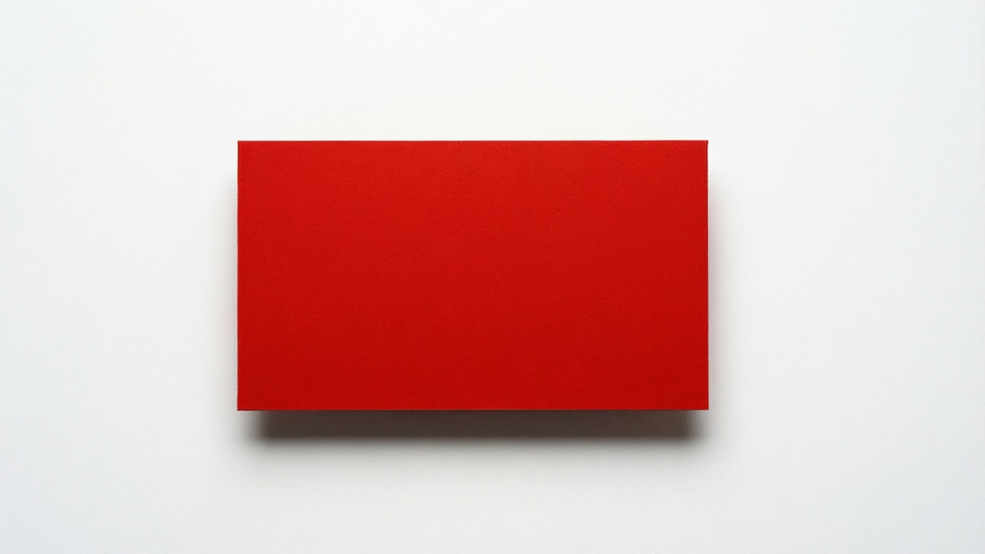 A red rectangle on white background with soft shadow