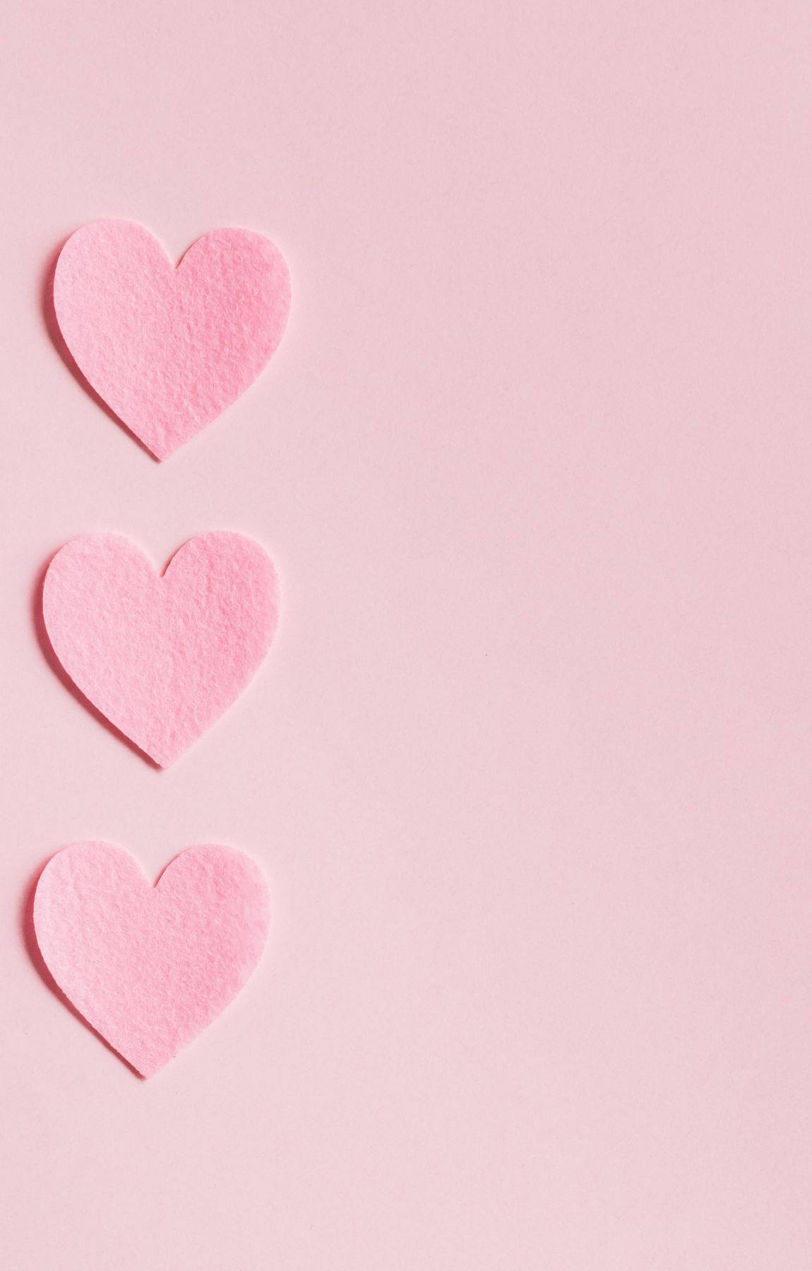 Minimalist Baby Pink Hearts Wallpaper