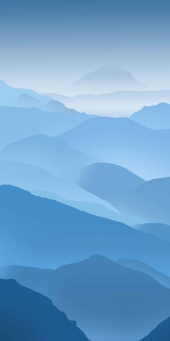 A Blue Sky With Mountains And Clouds Wallpaper