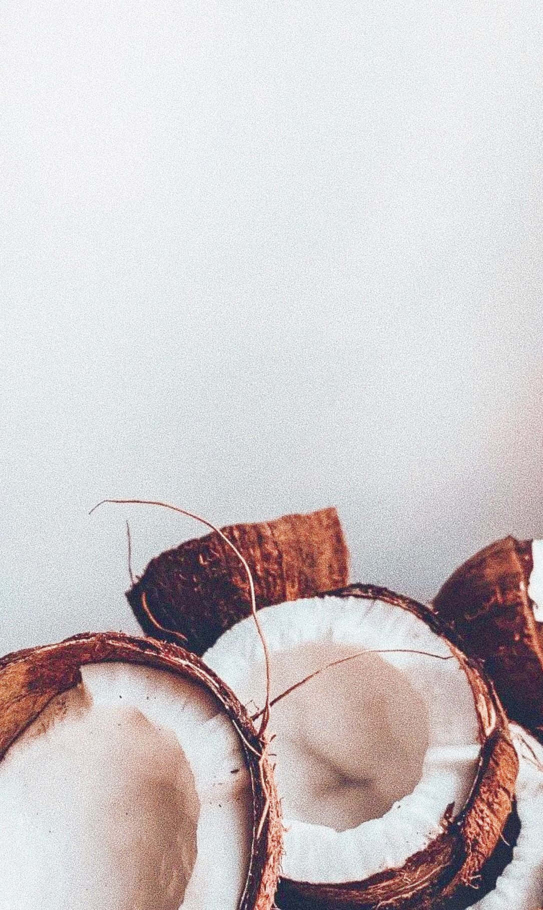 Minimalist Coconut Halves Aesthetic Wallpaper