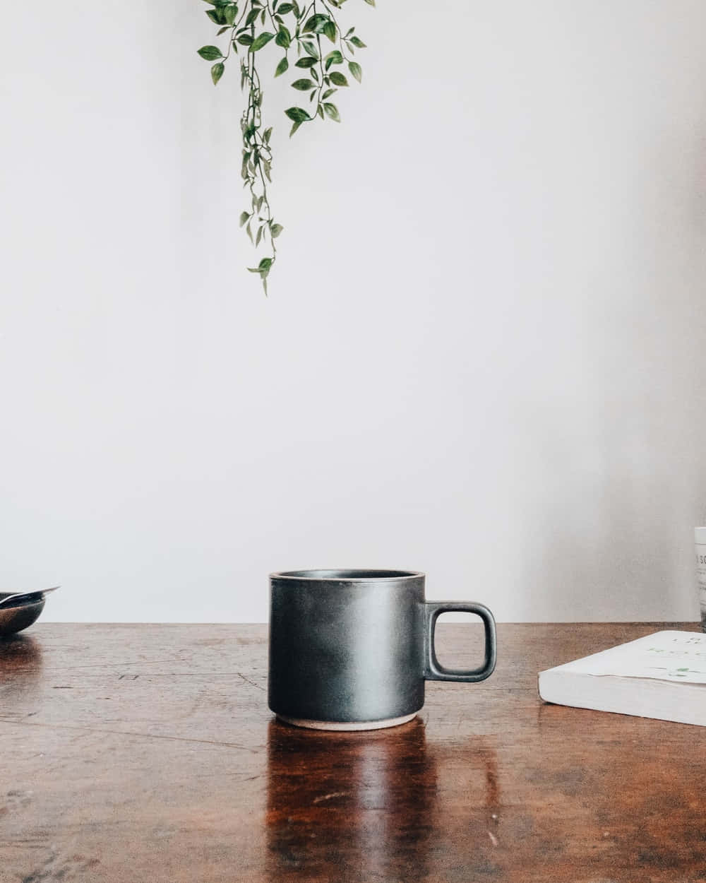 Minimalist coffee in a sleek white mug Wallpaper