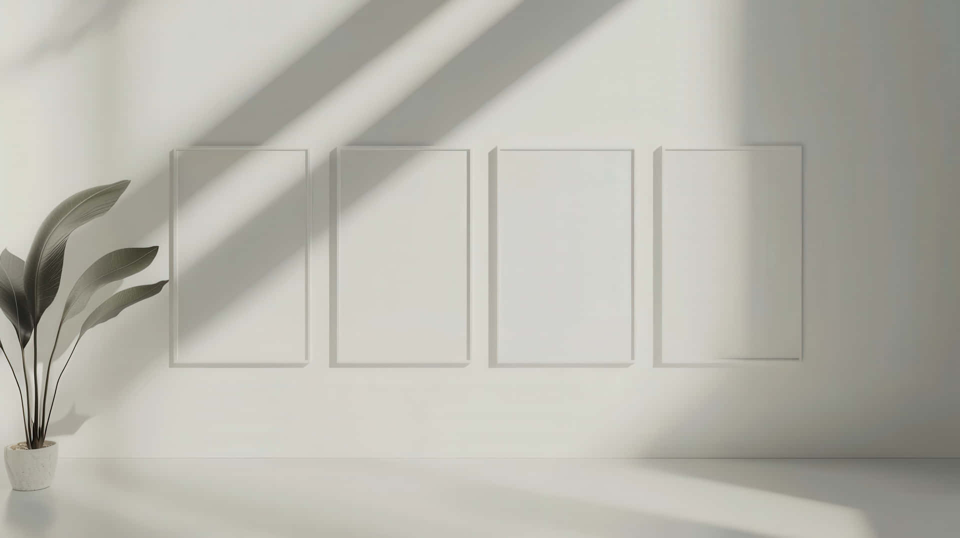 Minimalist Modern Interior With Empty White Frames, Soft Light, And Green Plant Wallpaper