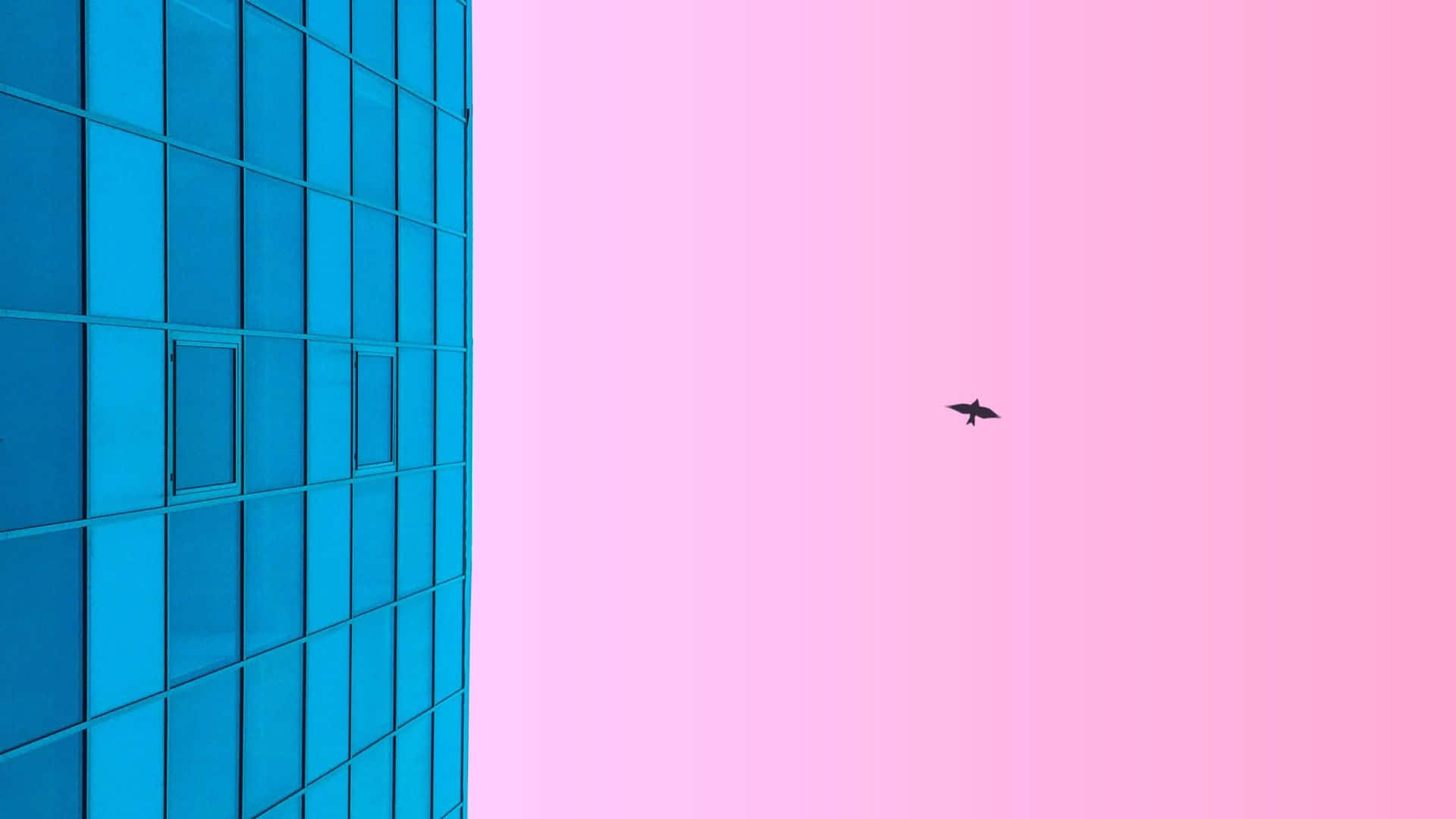 En blå himmel med pink og lilla skyer Wallpaper