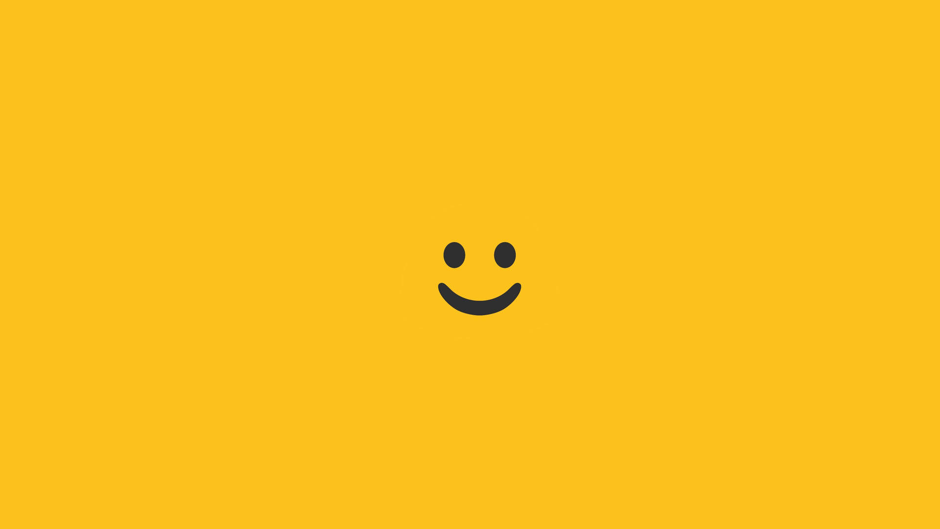 Minimalist Smiling Emoji in Mustard Background Wallpaper