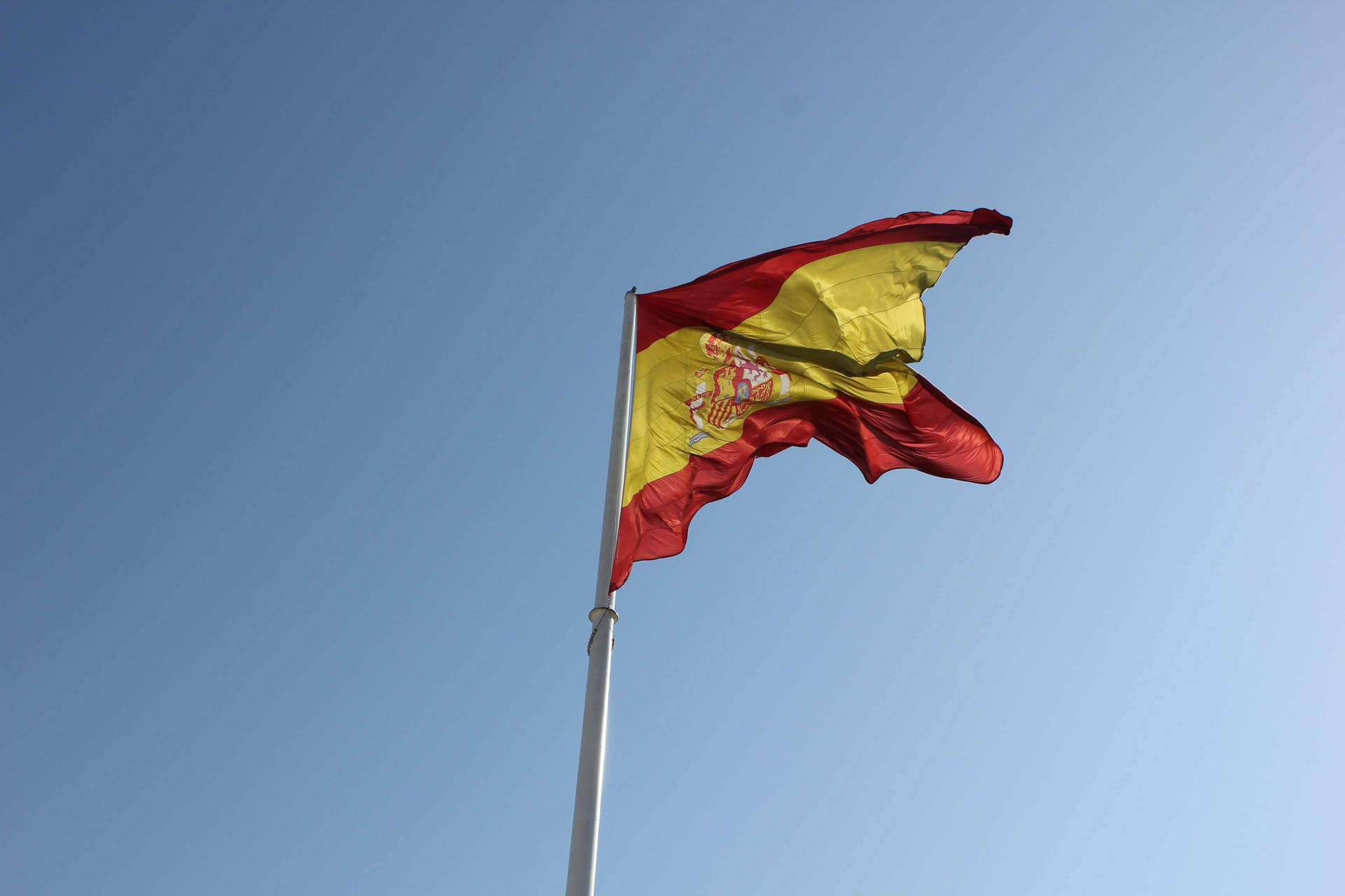 Minimalistisk spansk flag flyver Wallpaper