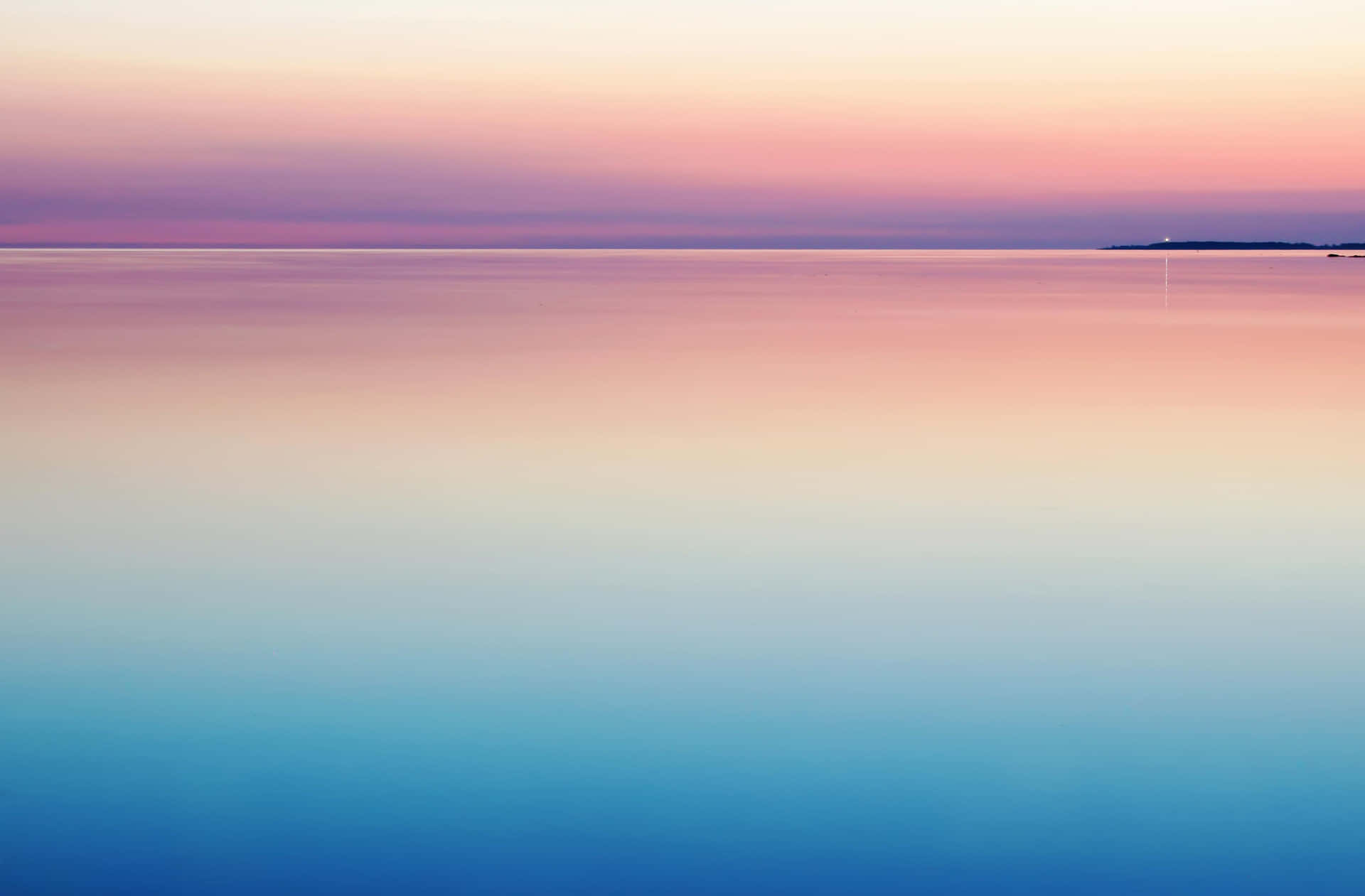Minimalist Sunset Over Serene Waters Wallpaper