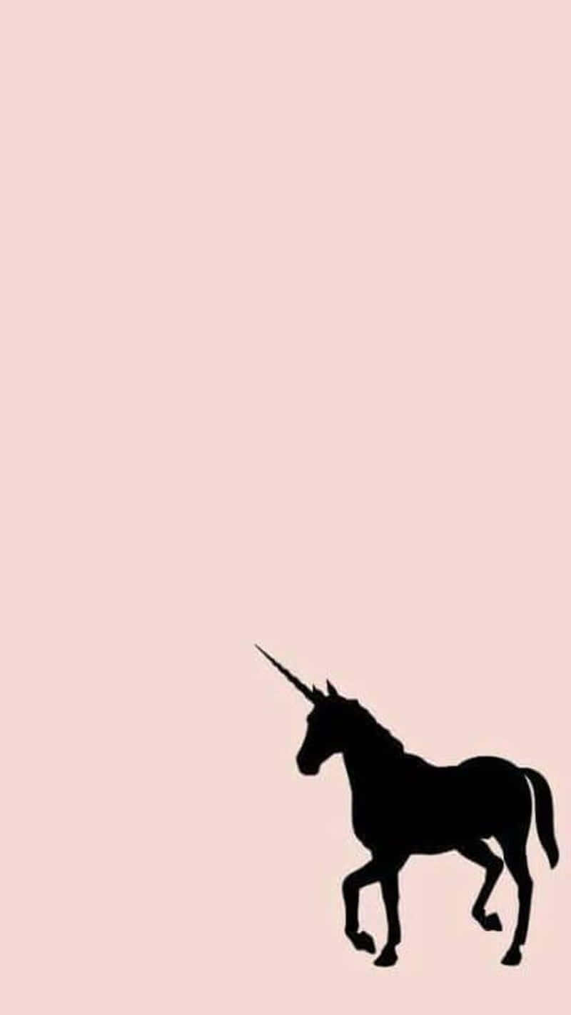 Minimalist_ Unicorn_ Silhouette_ Pink_ Background.jpg Wallpaper