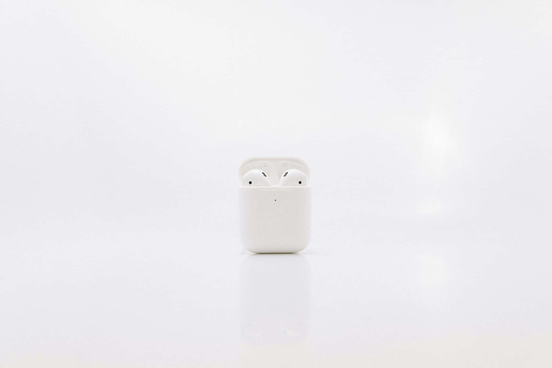 Minimalist White Wireless Earbuds Wallpaper
