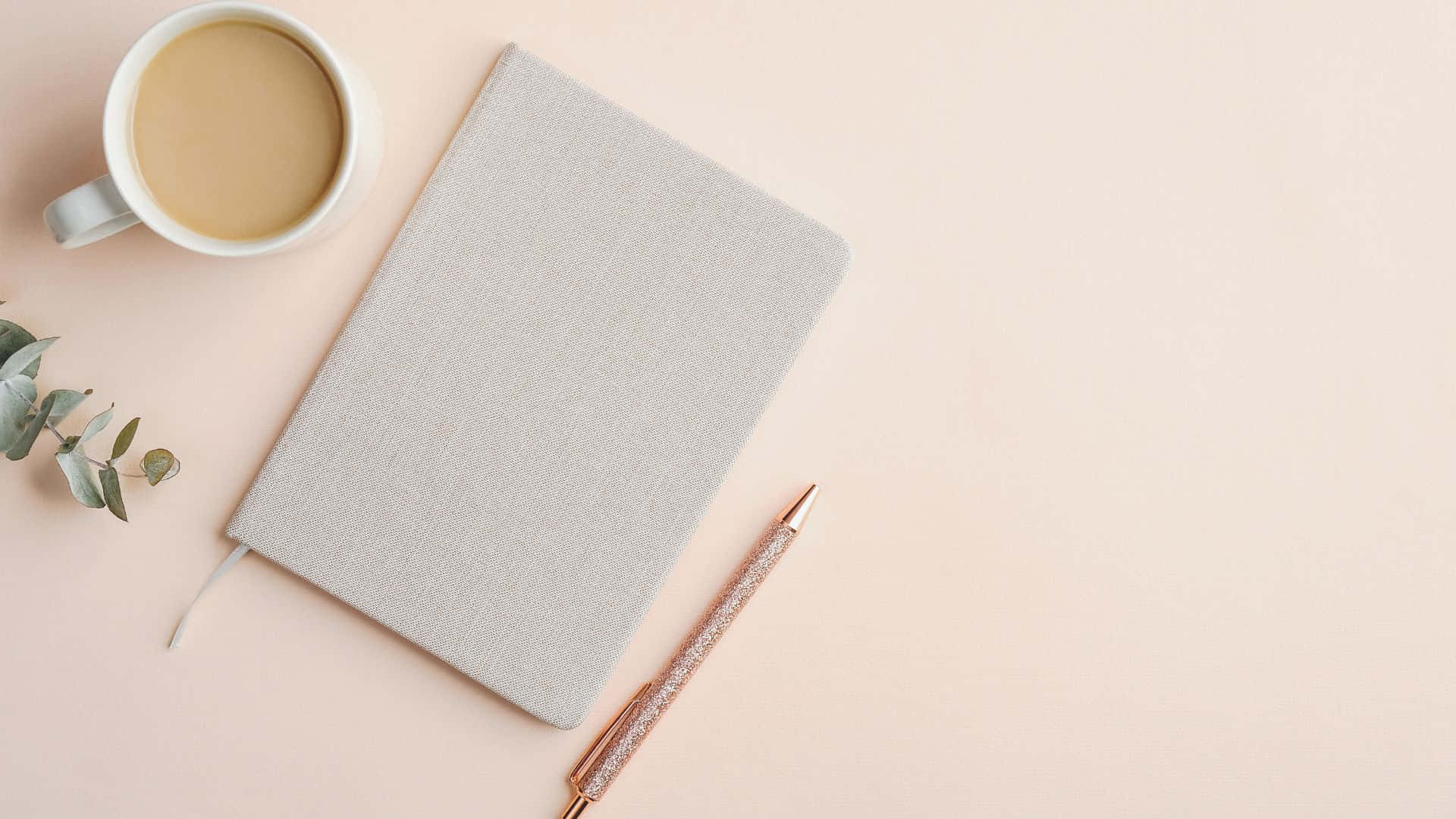Minimalist Workspacewith Notebookand Coffee Wallpaper