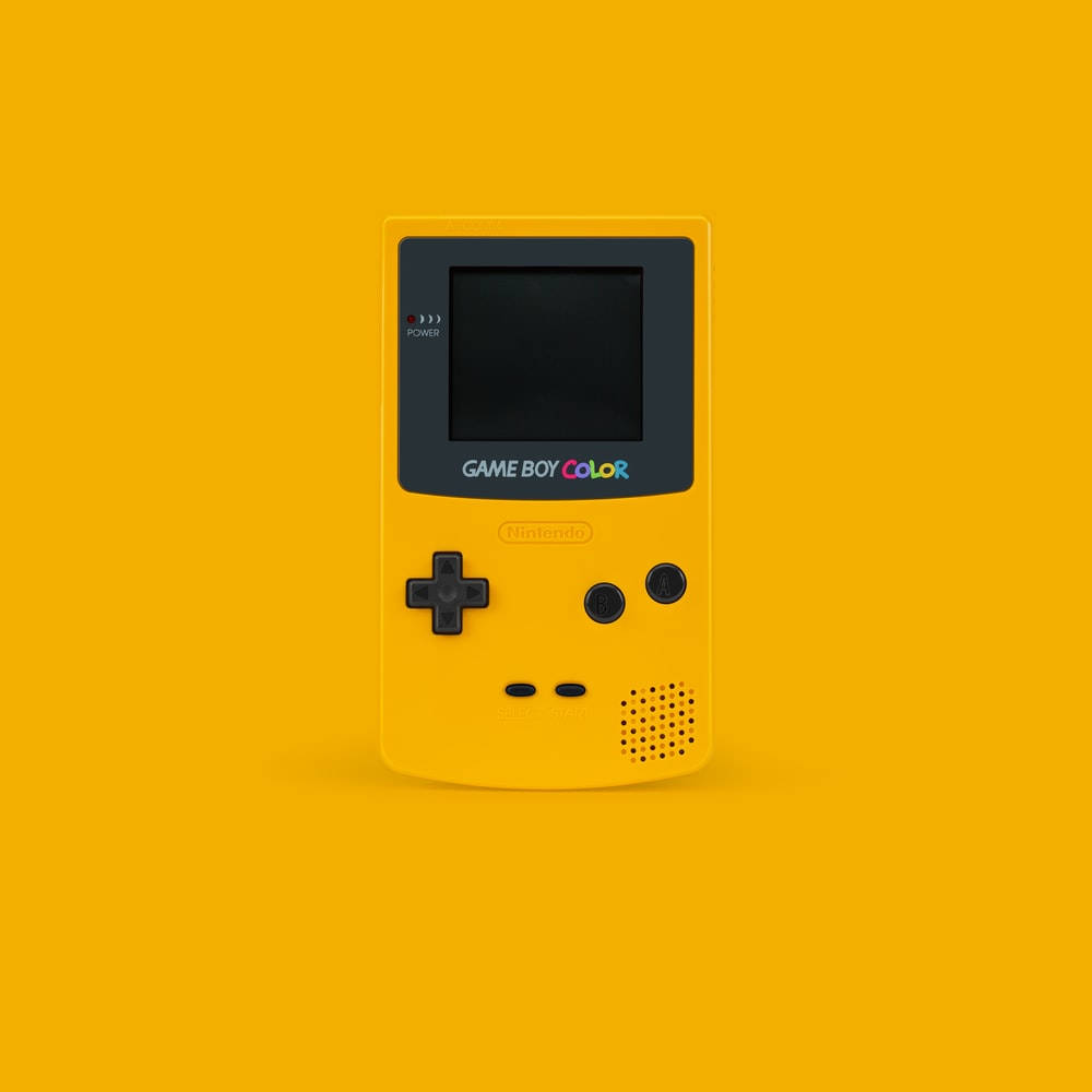 Juegode Game Boy Color Minimalista Amarillo. Fondo de pantalla