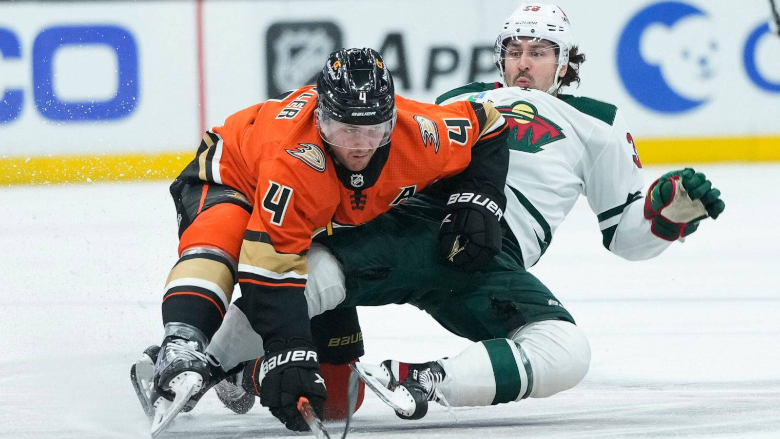 Cam Fowler in action against Mats Zuccarello of Minnesota Wild Wallpaper