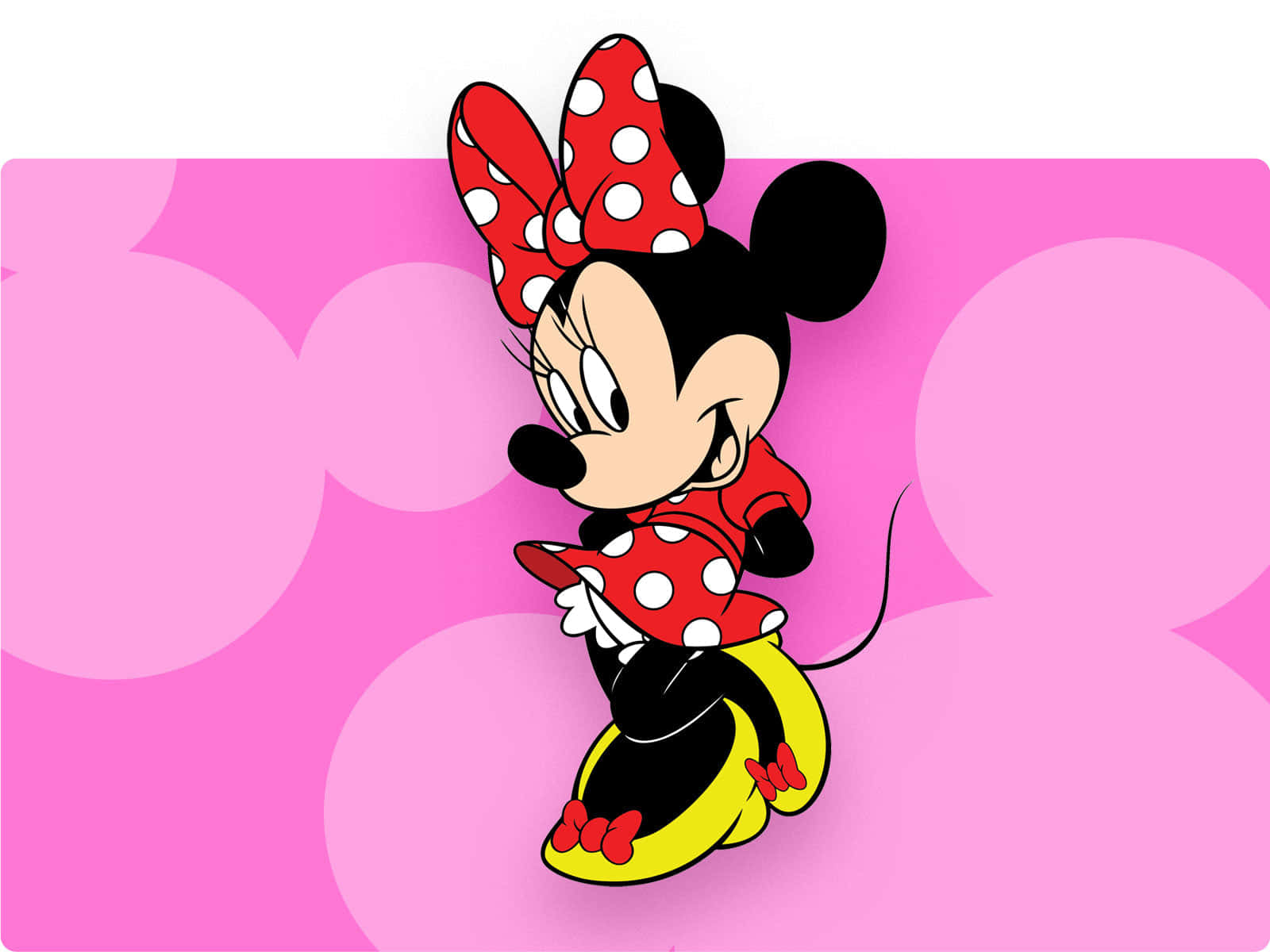 smiling Minnie Mouse with her signature bow.