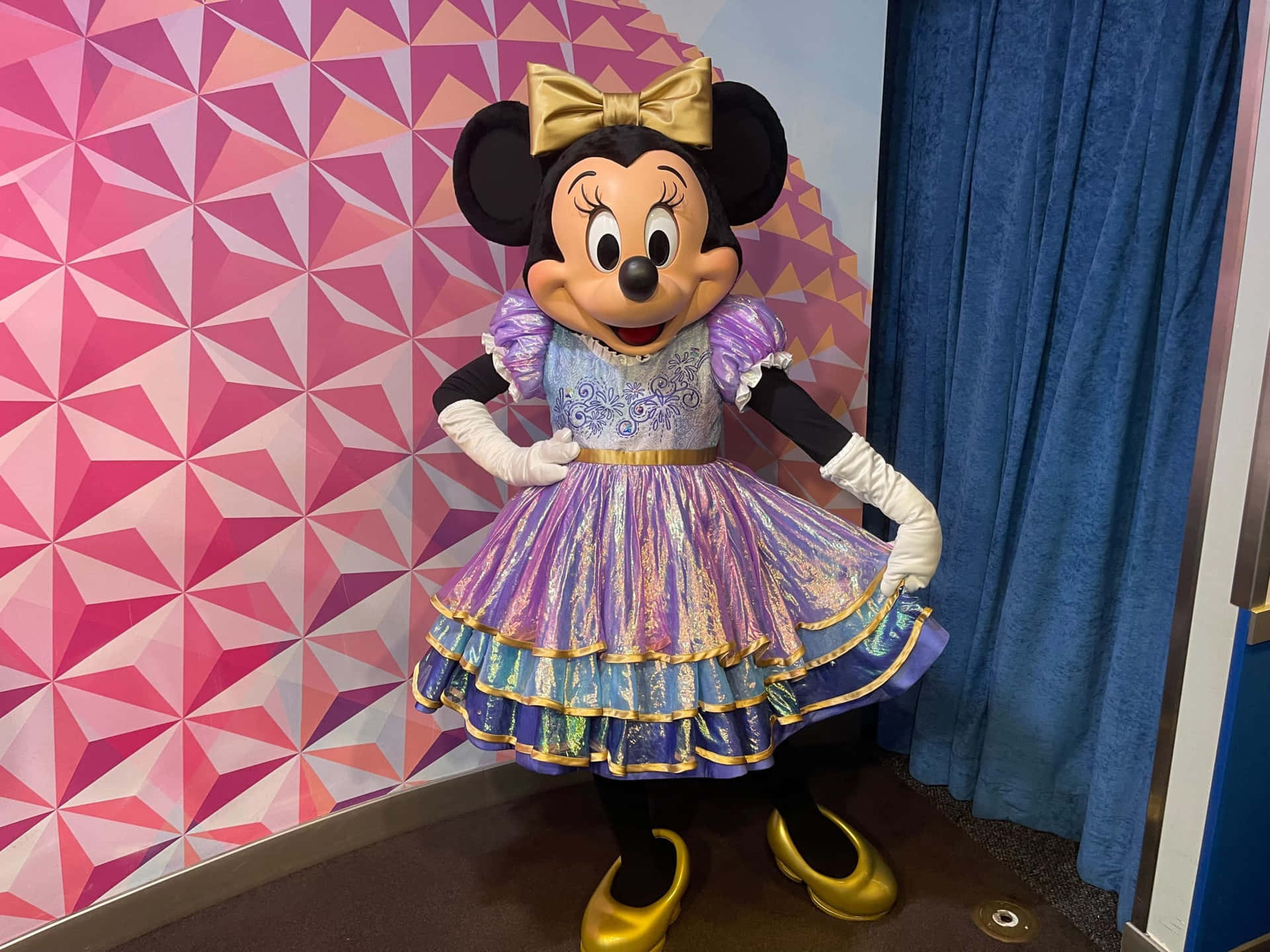"Minnie Mouse looking adorable with bow".