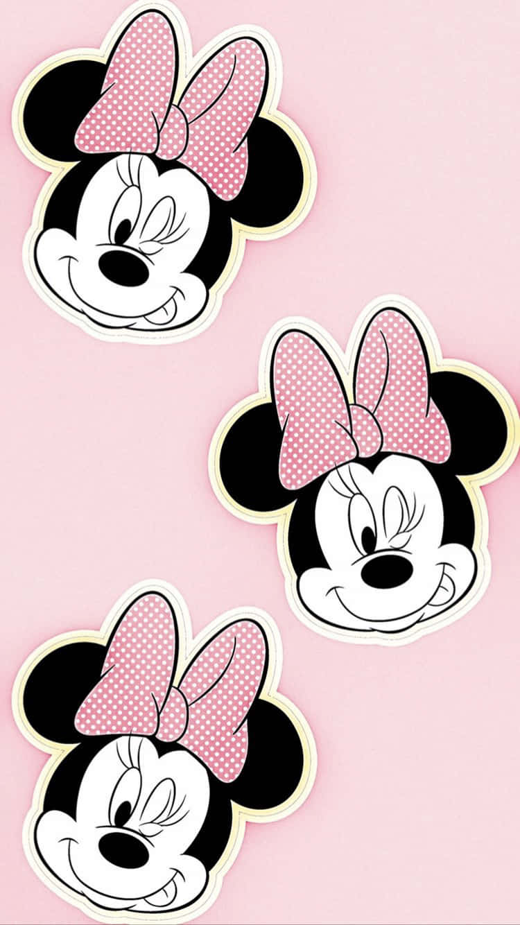 Dieniedliche Minnie Maus In Ihrem Ikonischen Rosa Kleid Wallpaper