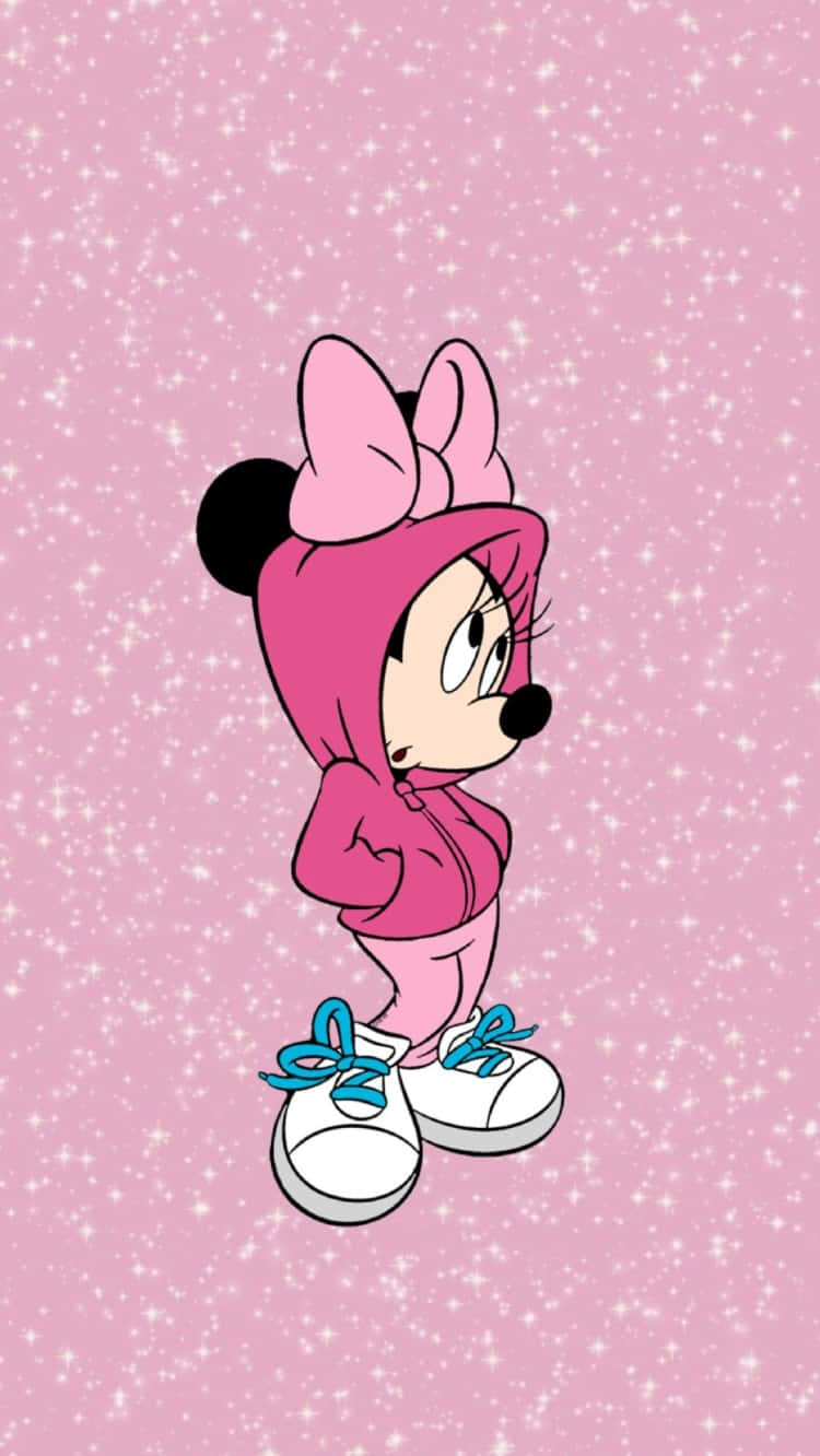Minnie Mus står i en sød lyserød kjole og hofte i denne sjove tapet. Wallpaper