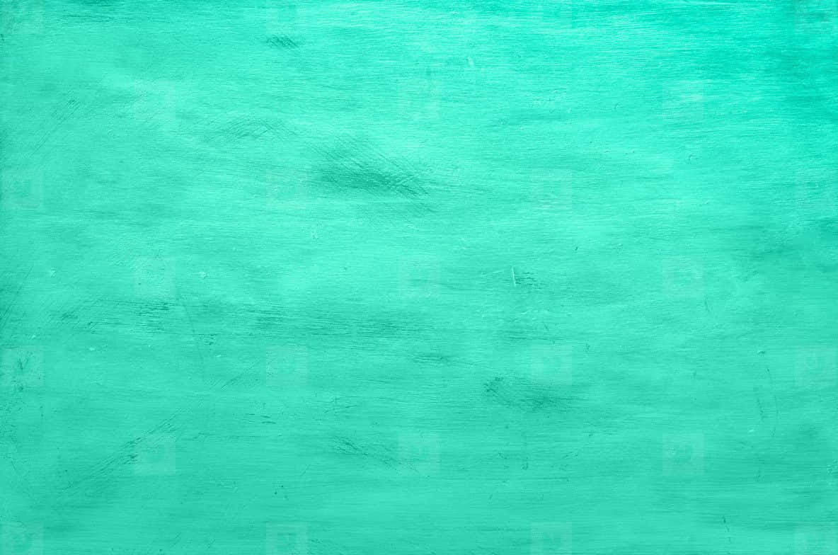A Turquoise Painted Background With A White Background