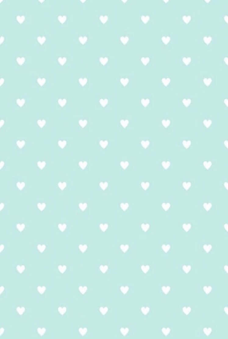 Add Some Fun to Your Day with Mint Green Hearts Wallpaper