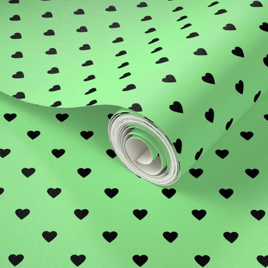 Grøn hjerte tapet med sorte hjerter Wallpaper