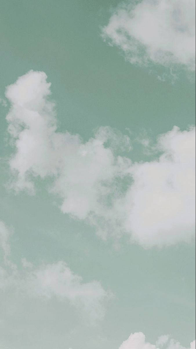 Clouds Against Mint Green iPhone Wallpaper