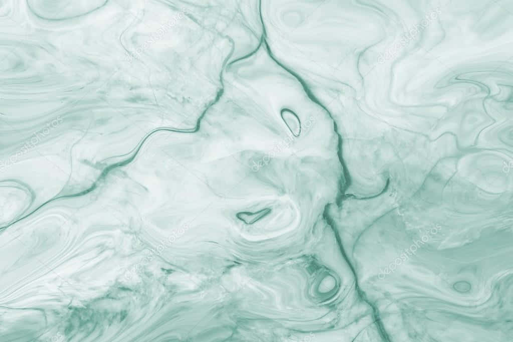 A Green Marble Background With A Lot Of Swirls Wallpaper
