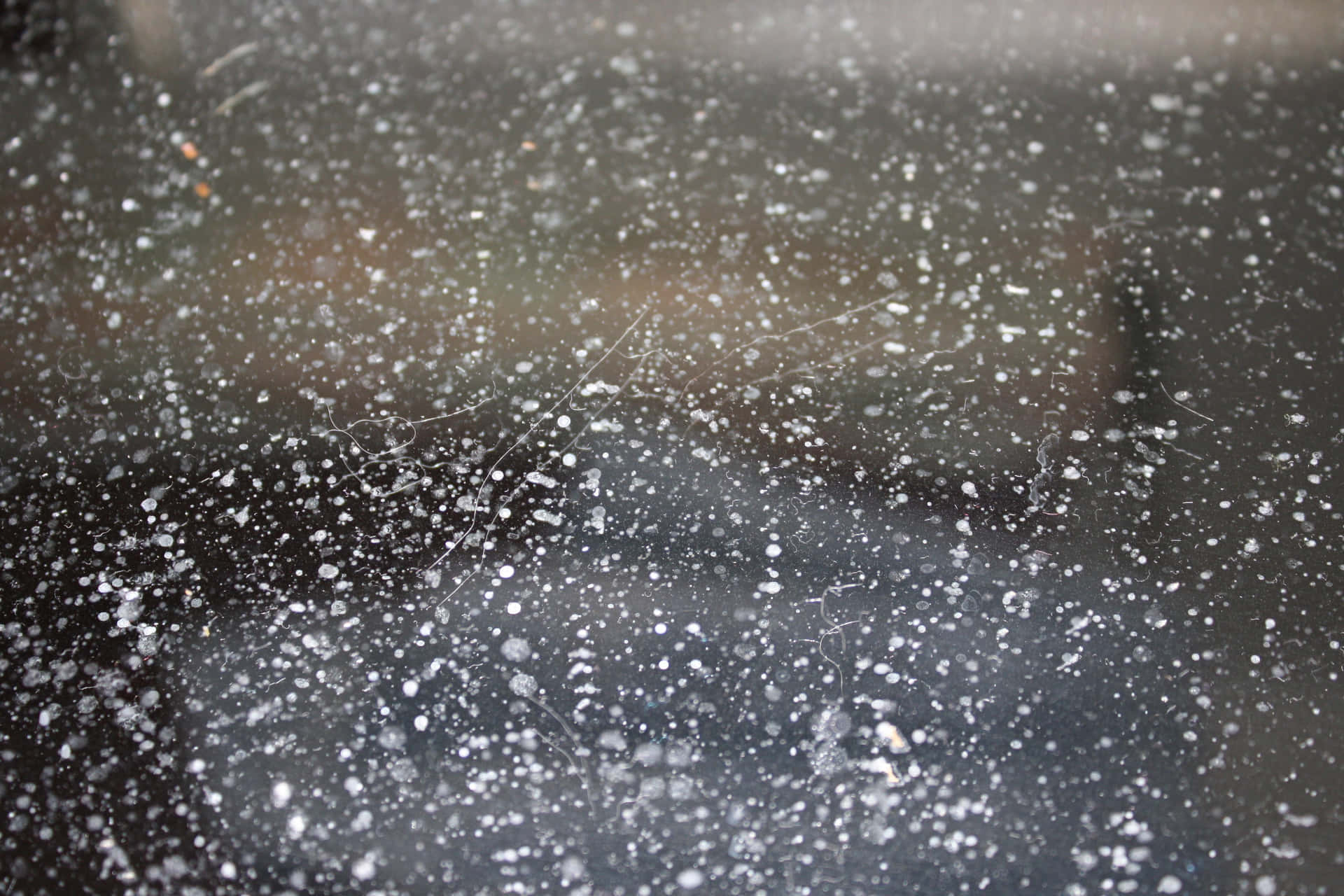 A Window With Water Drops On It