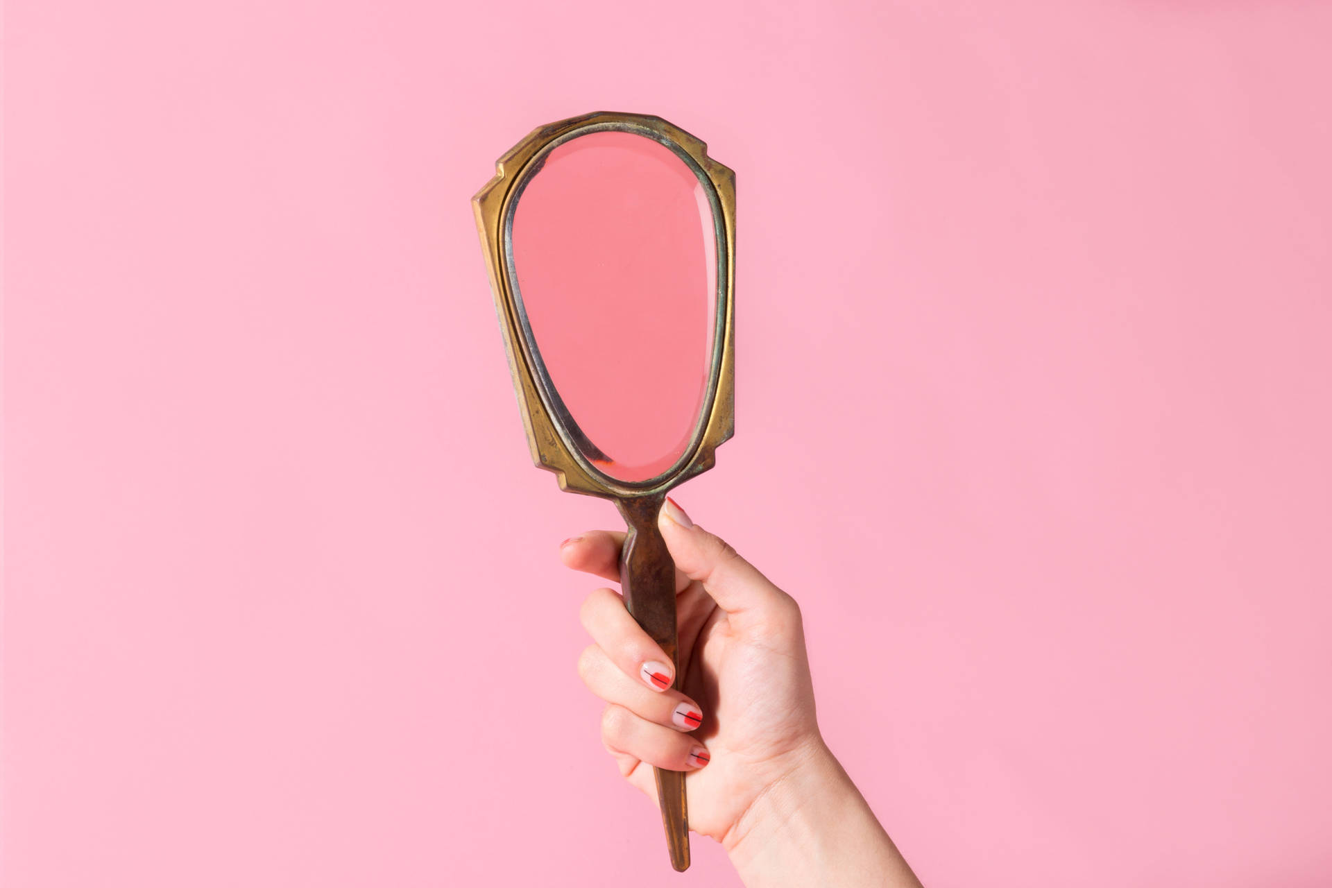 Mirror On Pastel Pink Color Background Wallpaper