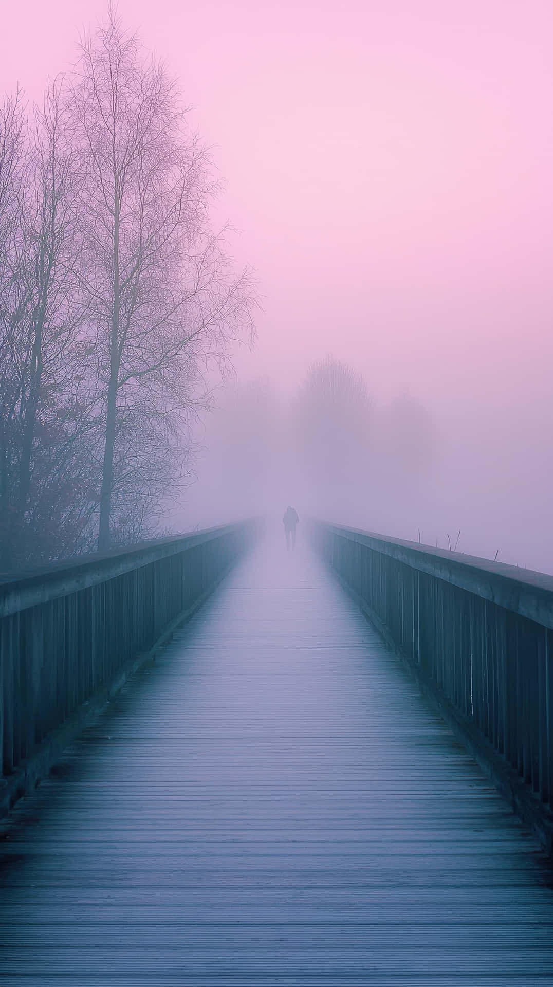 Misty Bridge At Dawn With Pink Hues And Trees - Serene And Atmospheric Scene Wallpaper