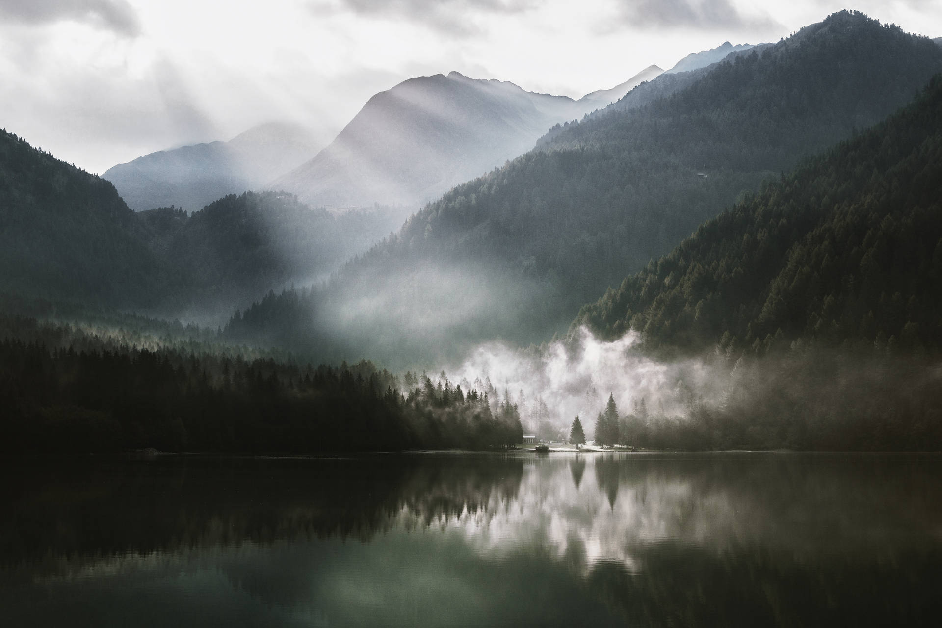 Misty Lake With Sunrays Wallpaper