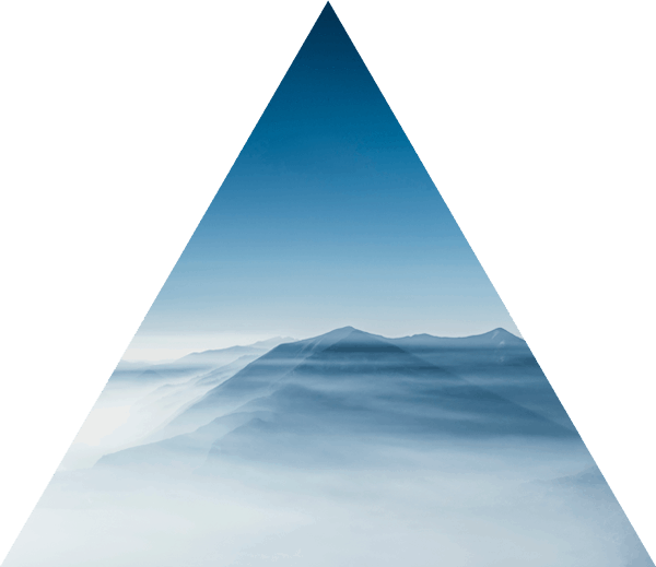 Download Misty Mountain Peaks Triangle View | Wallpapers.com