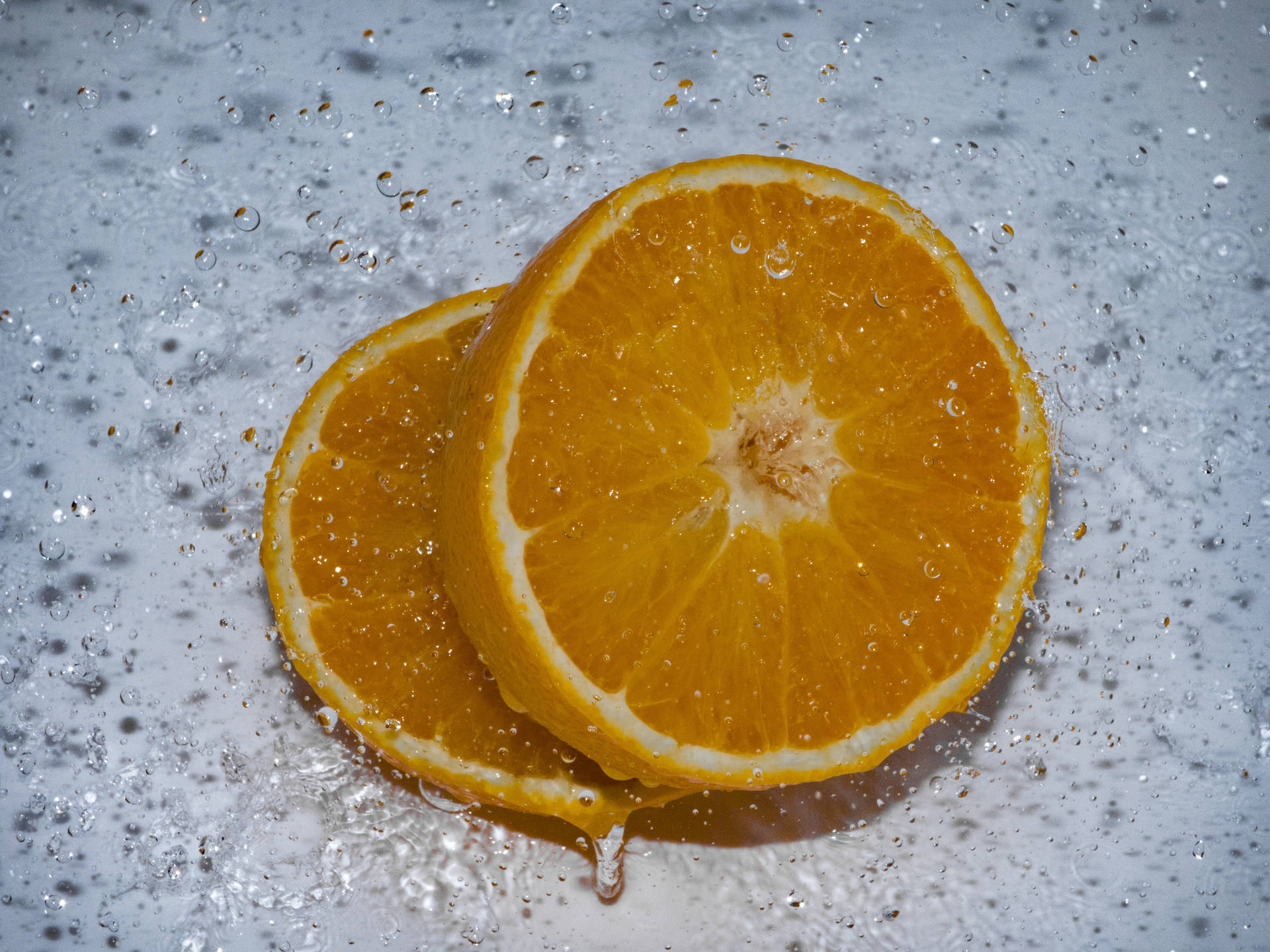 A delicious bowl of orange slices floating in a sea of mist Wallpaper