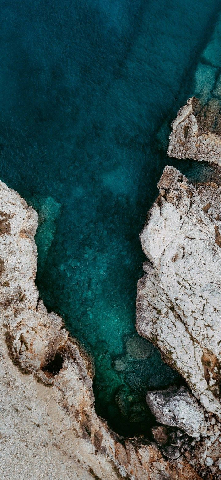 Miui Deep Blue Sea Beneath Cliff Wallpaper