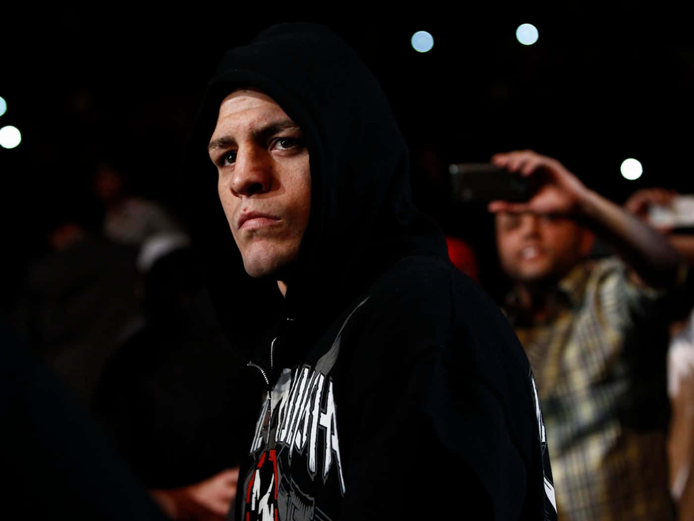 Mixed Martial Artist Nick Diaz With A Hoodie On Wallpaper