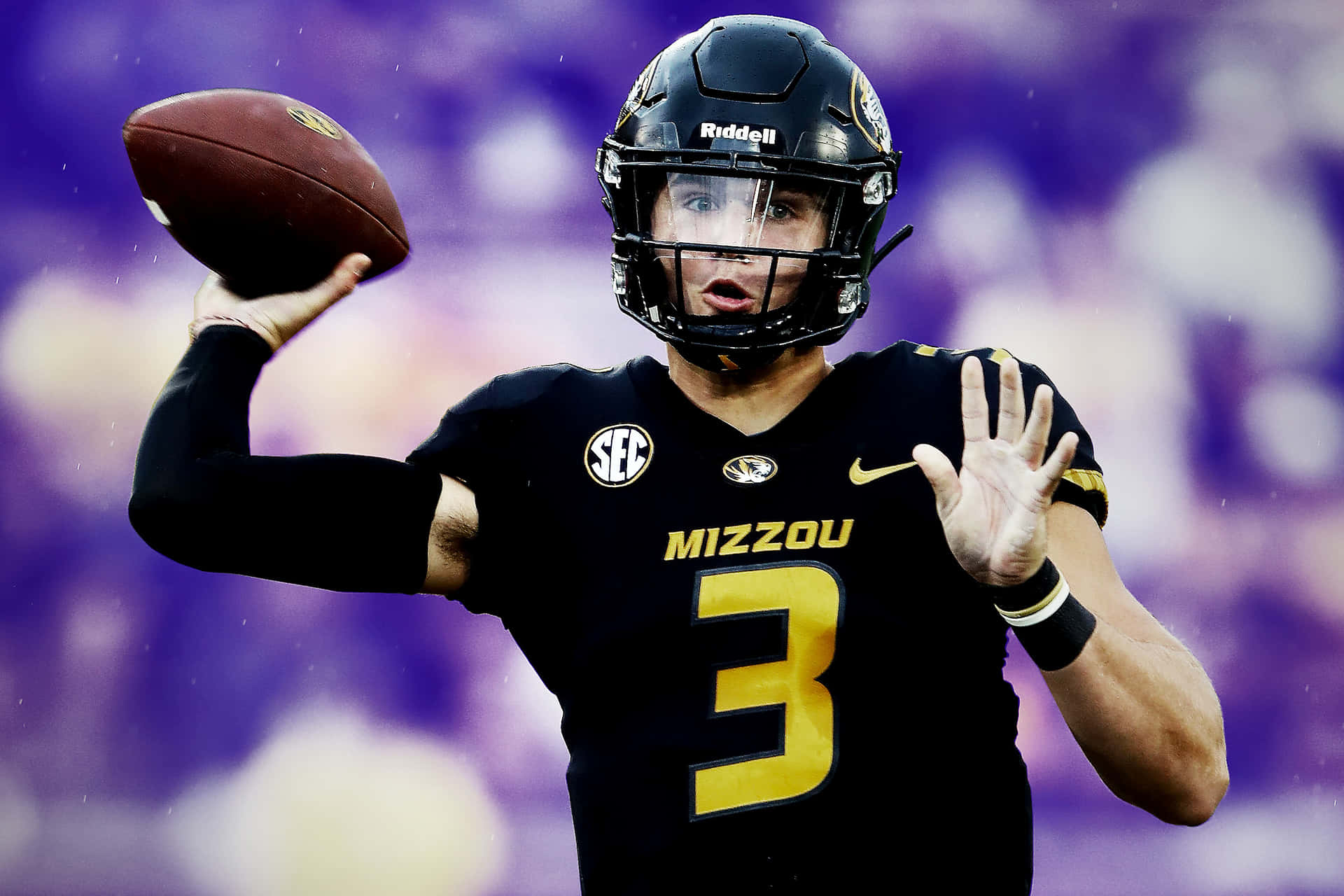 Mizzou Quarterback Drew Lock In Action Wallpaper