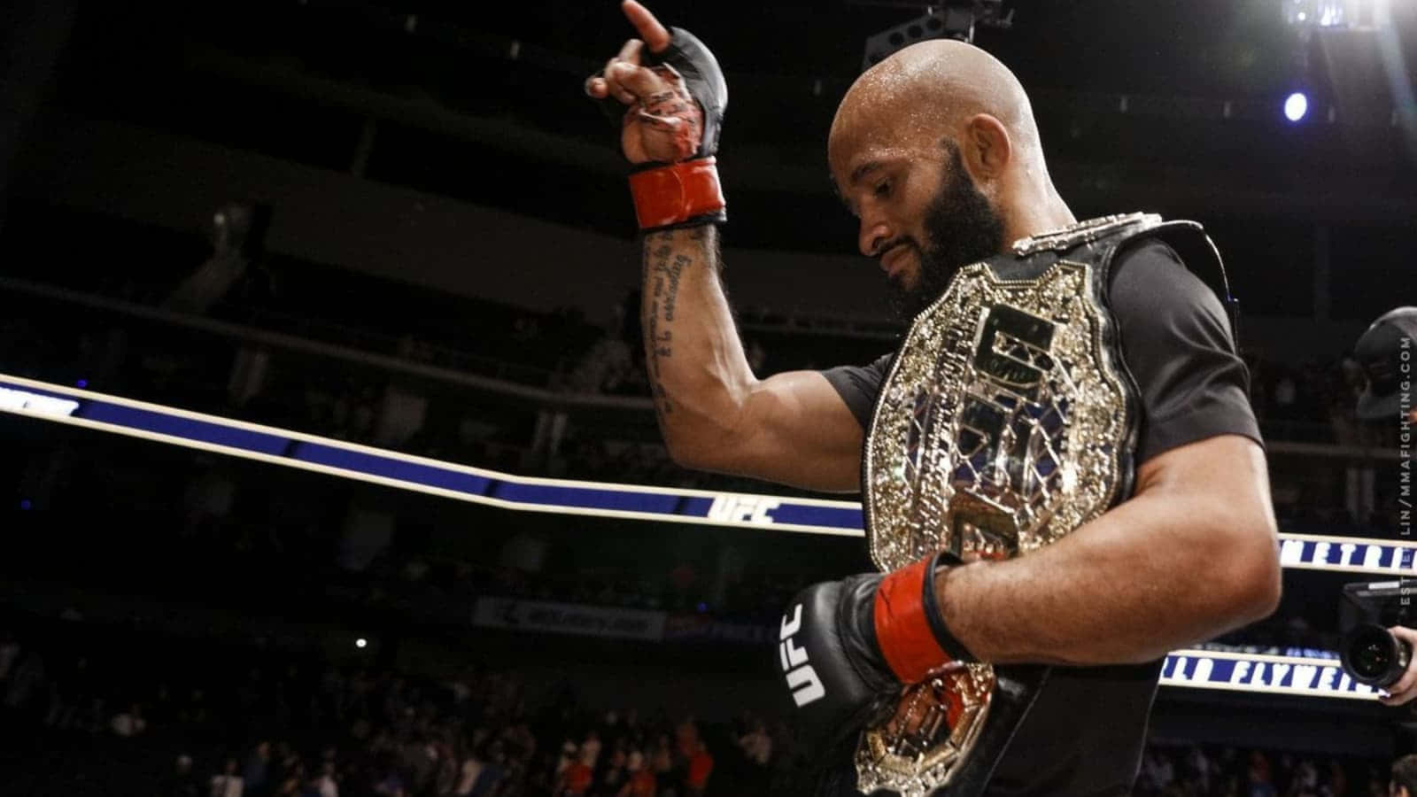 Mma Champion Demetrious Johnson As Mighty Mouse Background