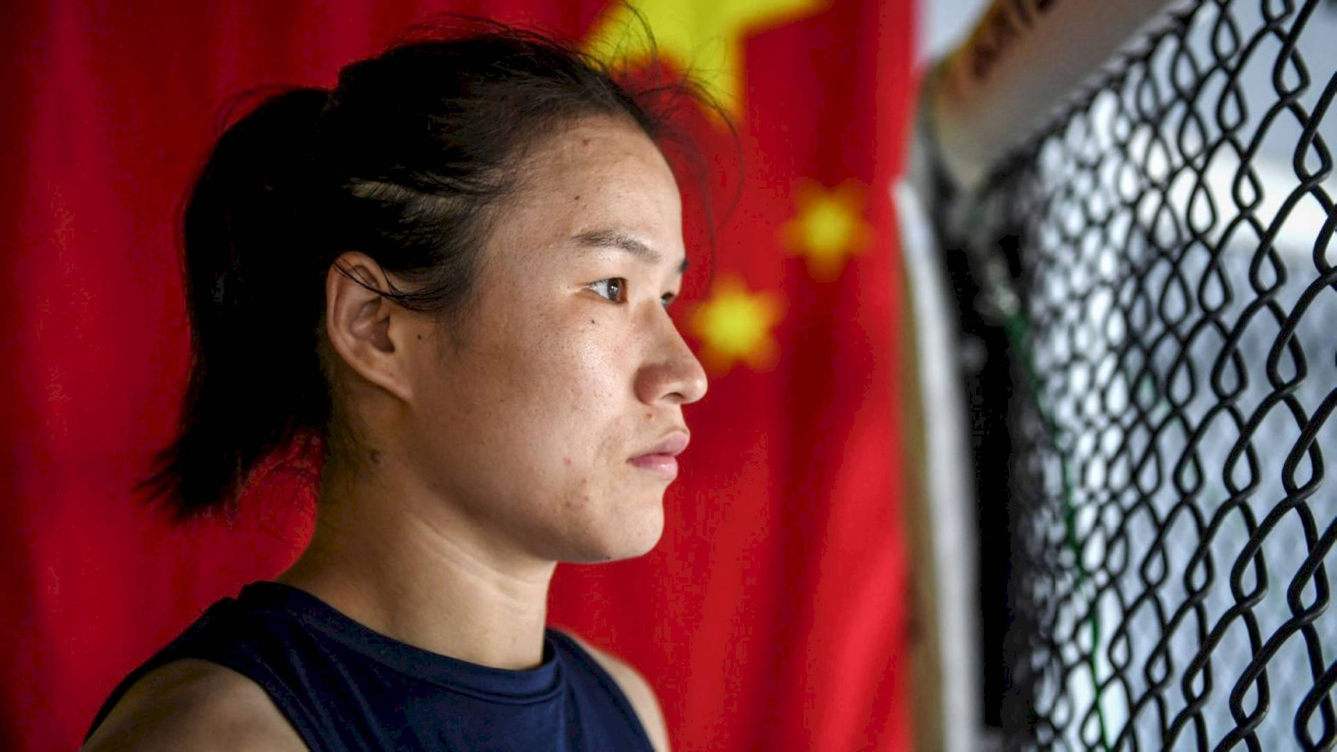 MMA Fighter Zhang Weili Side Profile Ærefrygt Wallpaper Wallpaper