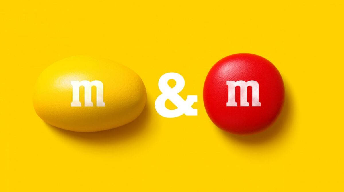 A delightful assortment of M&Ms peanut and classic chocolate candies. Wallpaper