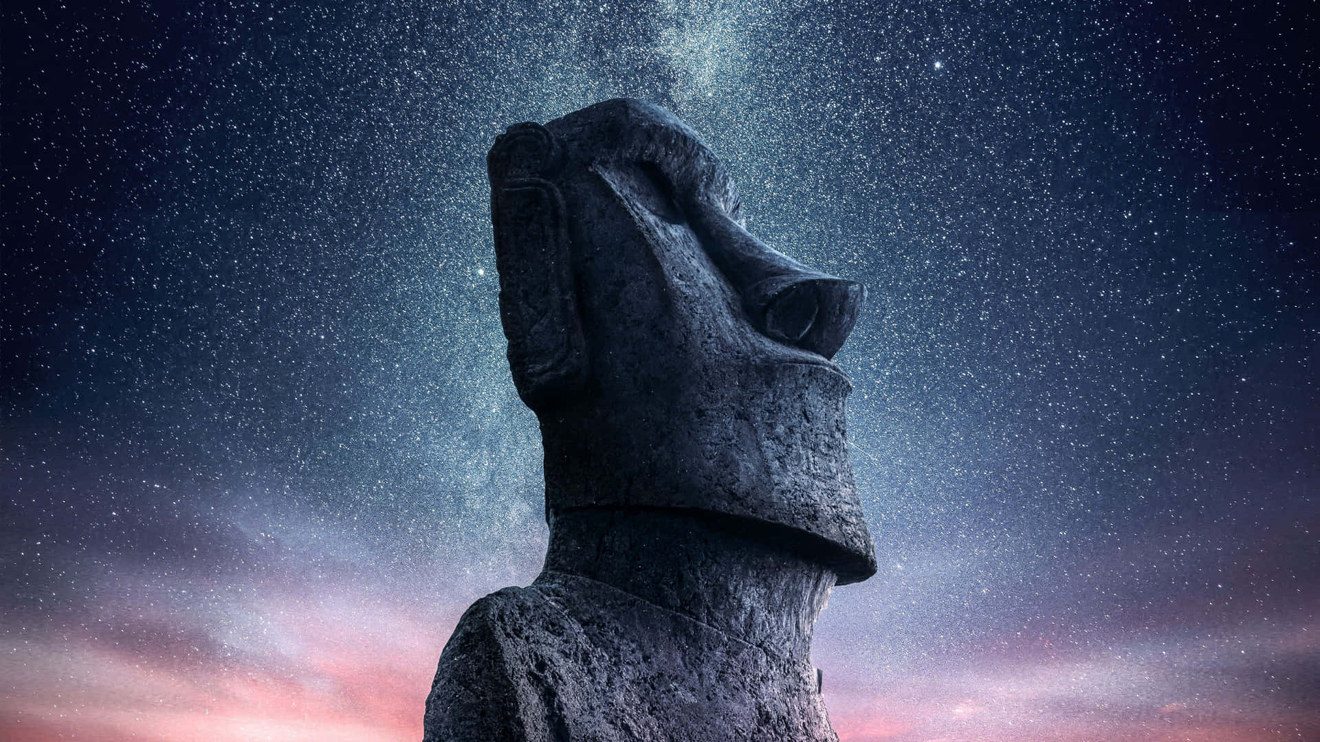 Estatuade Moai Contra Un Cielo Lleno De Estrellas. Fondo de pantalla