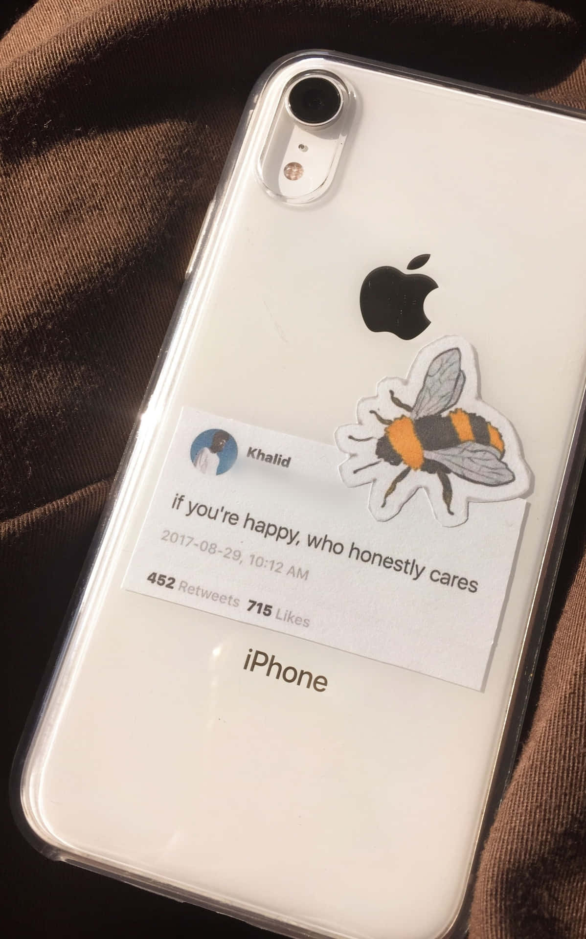 A Phone Case With A Bee Sticker On It