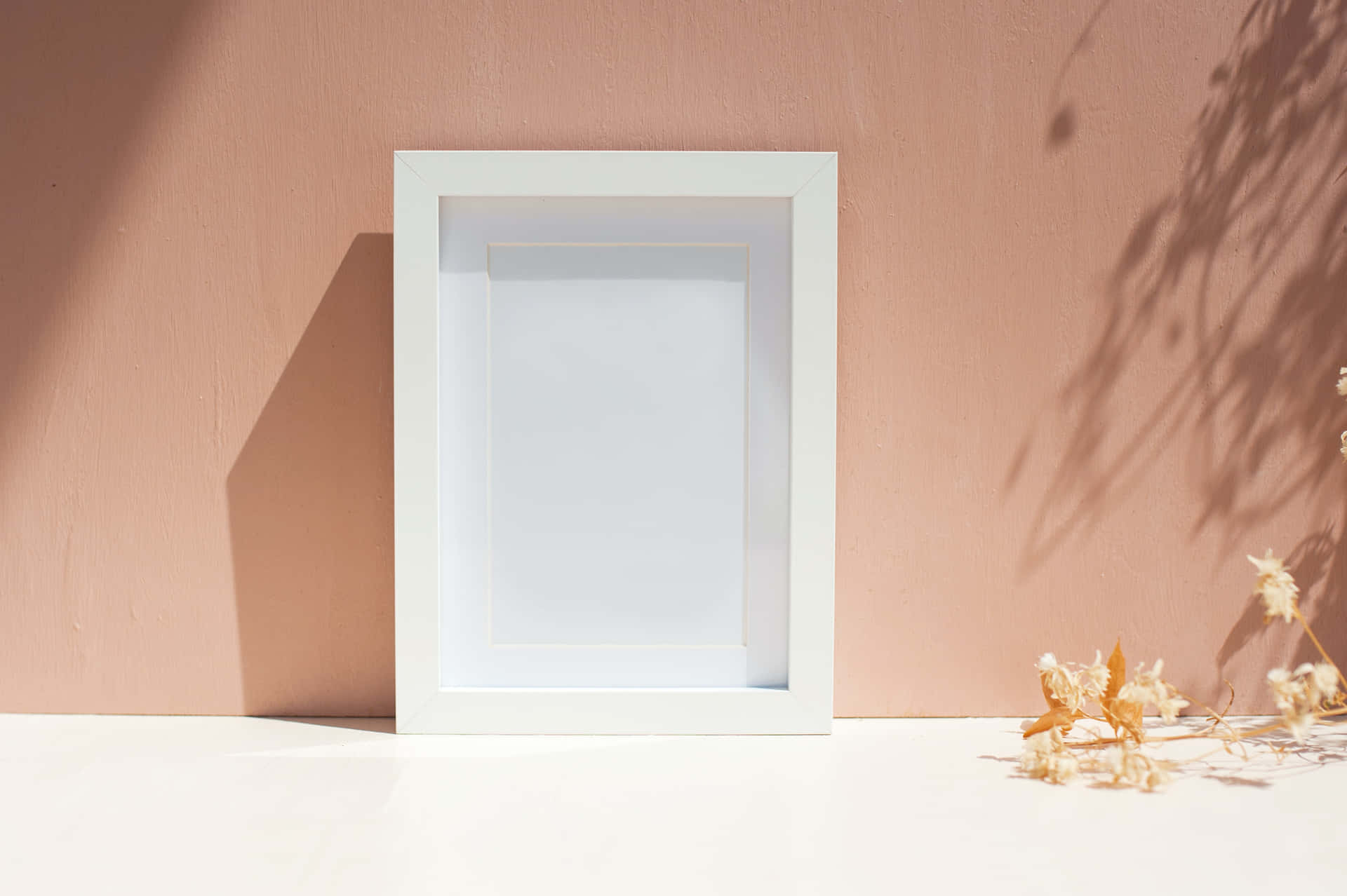 A White Frame With A Blank Picture Inside