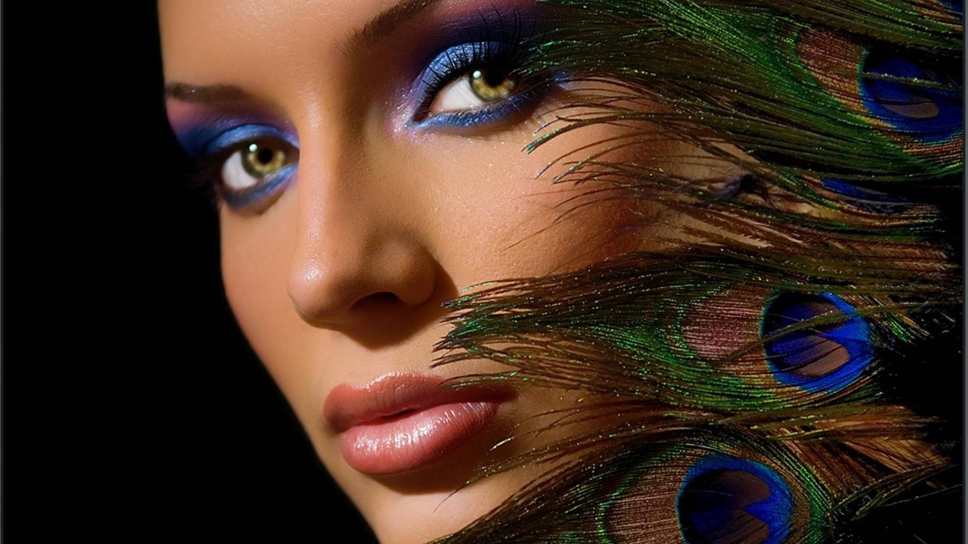 Model's Face With Peacock Feather Wallpaper