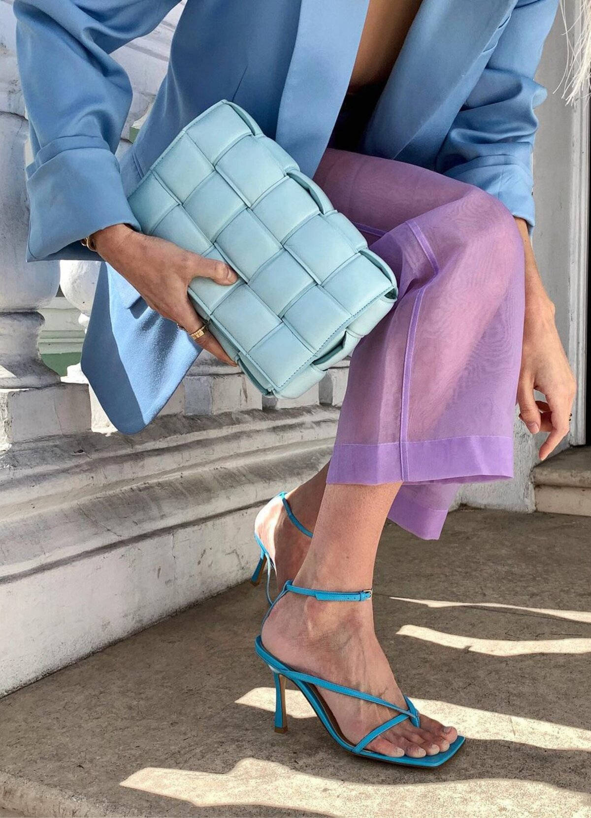 Model With Baby Blue Bottega Veneta Bag Background
