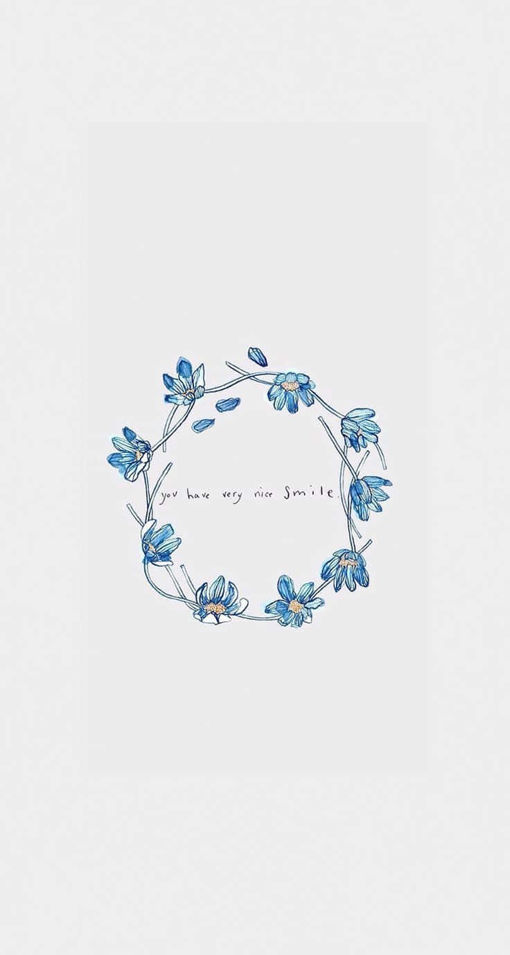 En blå blomst krans med ordene 