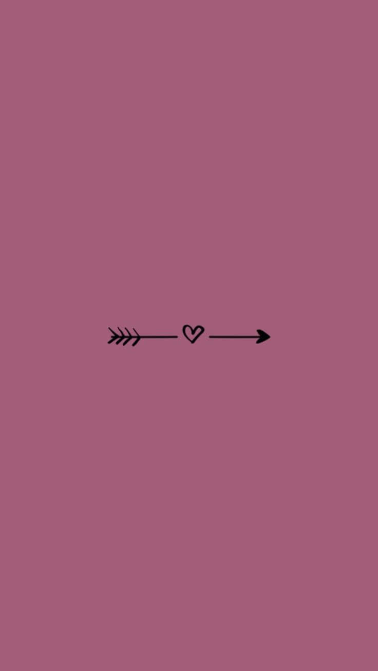 Arrow With Heart On A Pink Background Wallpaper