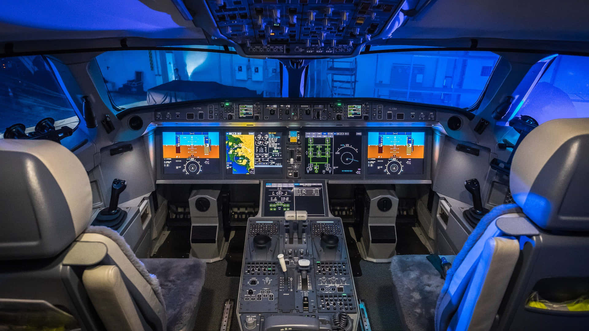 Modern Airplane Cockpitat Dusk Wallpaper