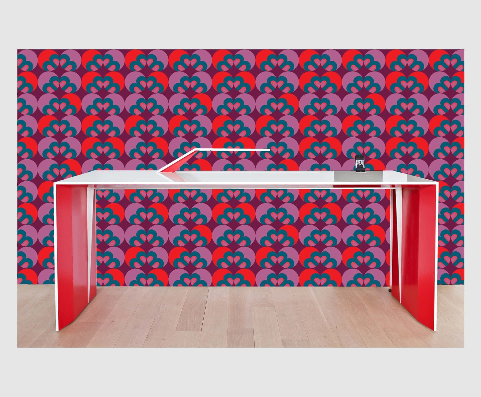 Modern Desk Against Patterned Wallpaper Wallpaper