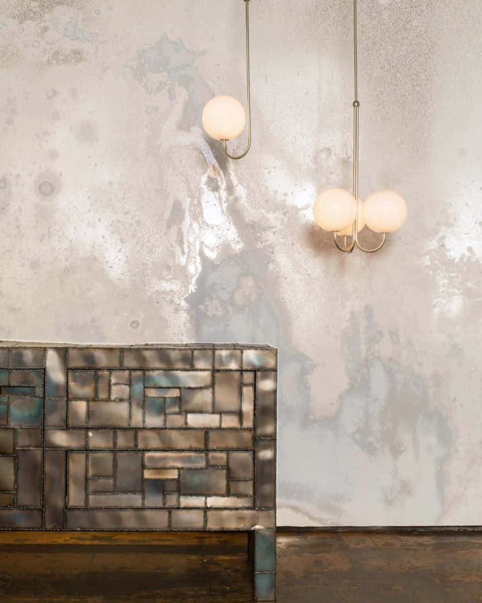 Modern Interiorwith Tiled Sofaand Pendant Lights Wallpaper