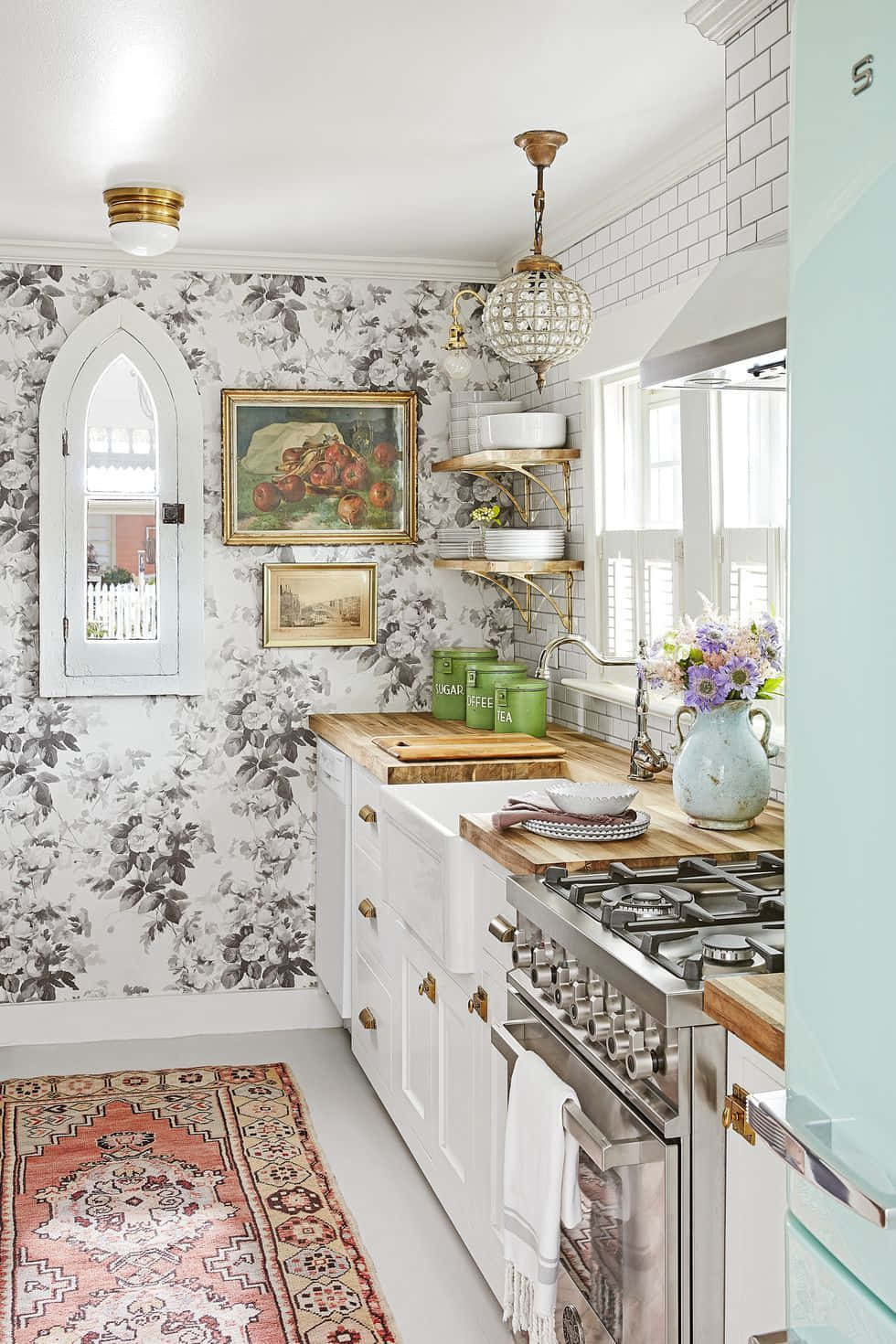 A Kitchen With A Floral Wallpaper And A Green Rug Wallpaper