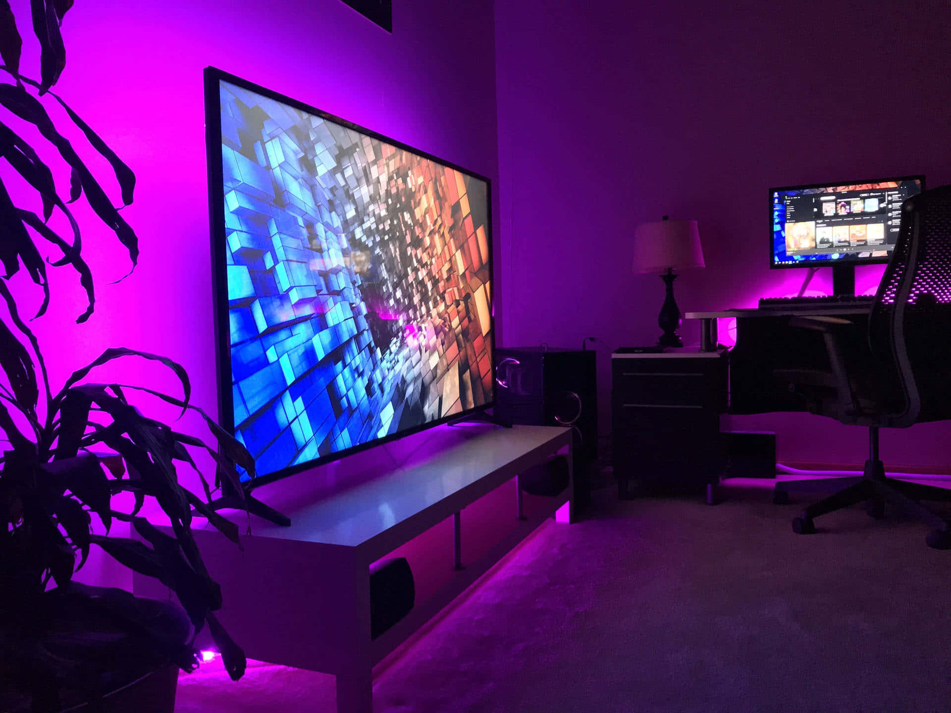 Modern Neon Lit Home Entertainment Setup Wallpaper