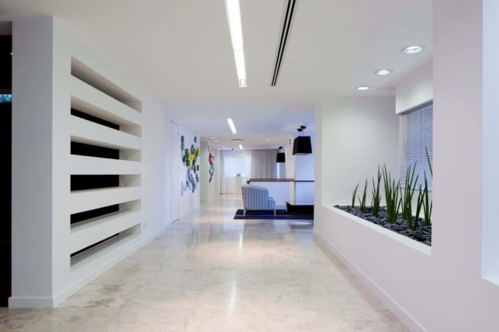 A Hallway With White Walls And Plants