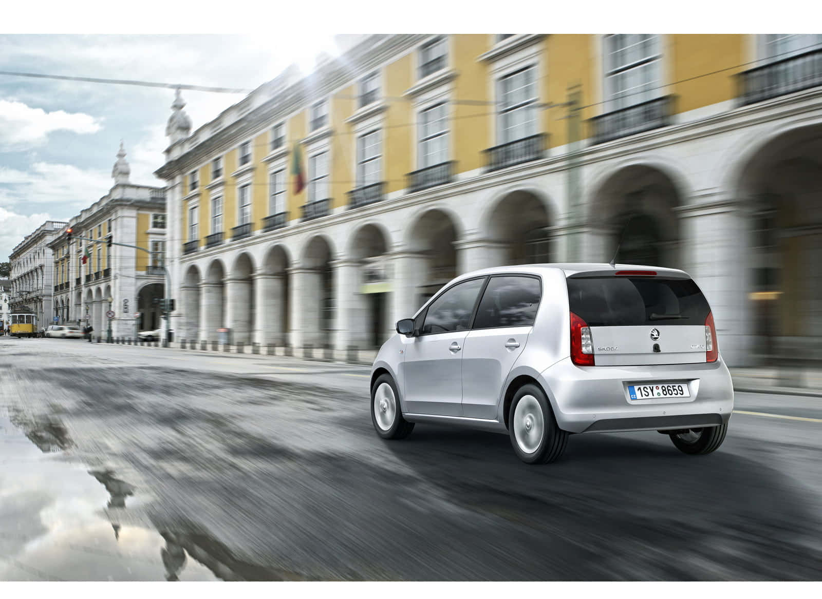 Modern Skoda Citigo In Dynamic City Environment Wallpaper